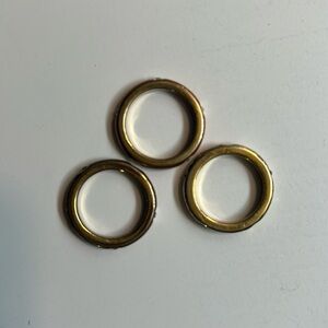 Lot of 3 matching silver/ gold/ bronze uniform stacking rings size 6.5